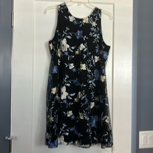 Two layered cute lace overlay. Ties in the back